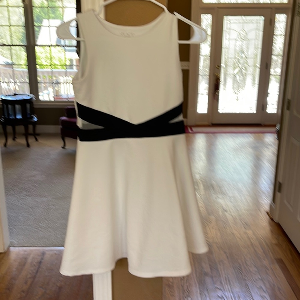Girl short formal white dress with mesh inserts and black accents